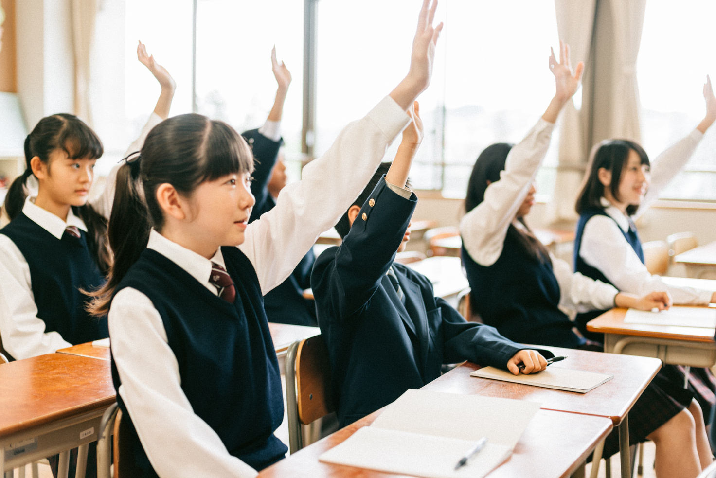 Japanese Junior High School Students Raising hands